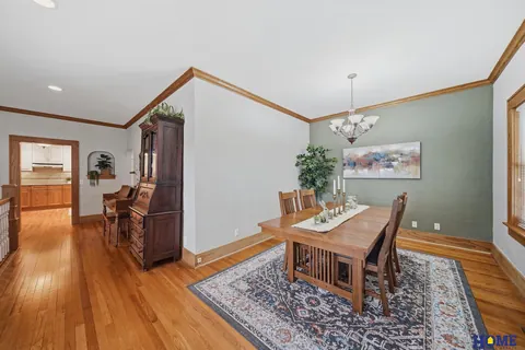 207 W 4th Street: formal dining room with wood floors and oak trim