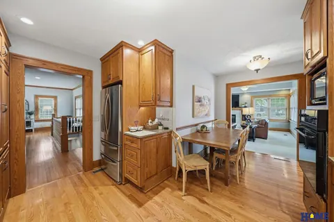 207 W 4th Street: kitchen with oak cabinets, open to the informal dining nook