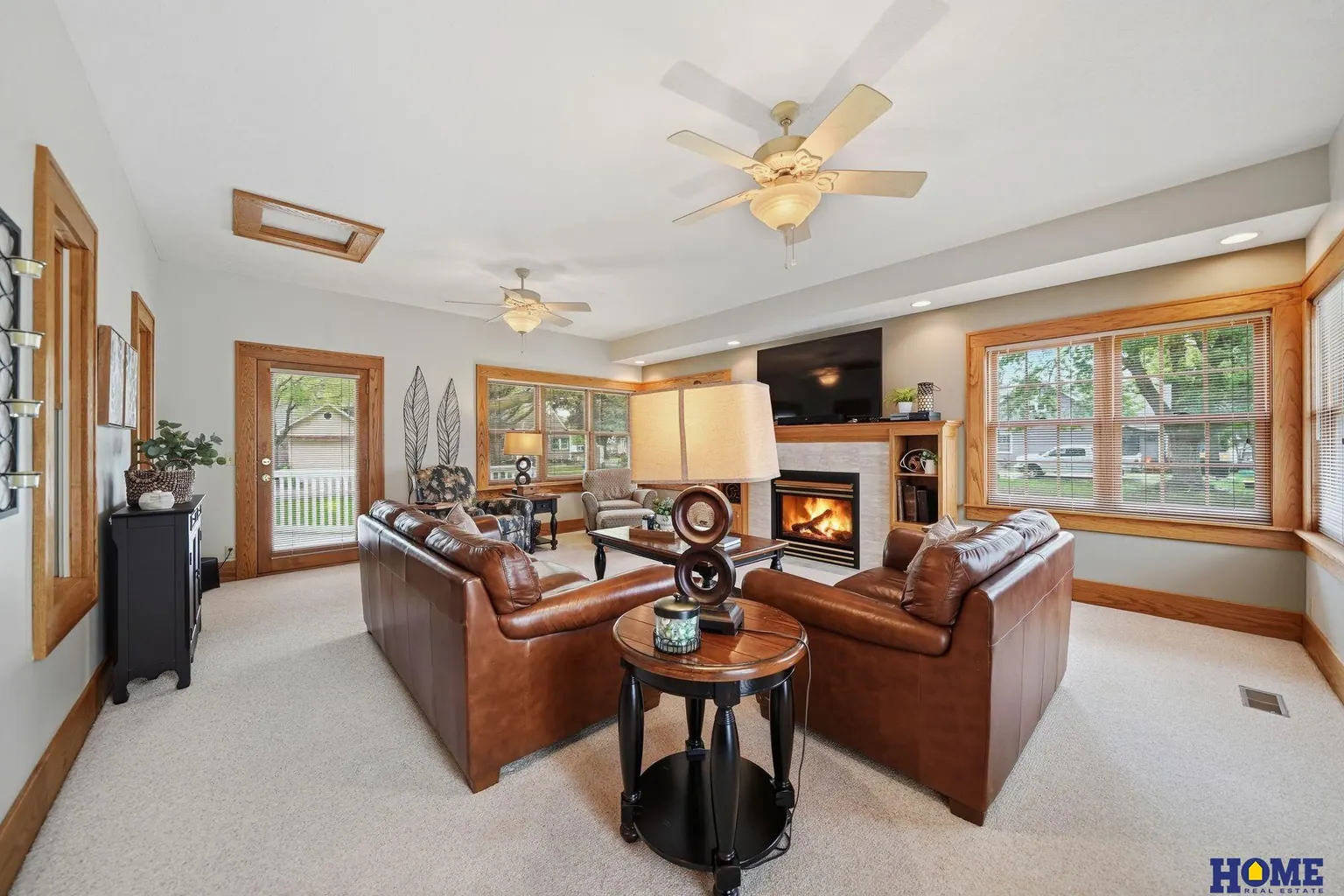 207 W 4th Street: living room with the fireplace wall and oak built-ins