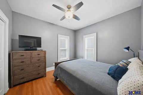 207 W 4th Street: main-floor bedroom with wood floors