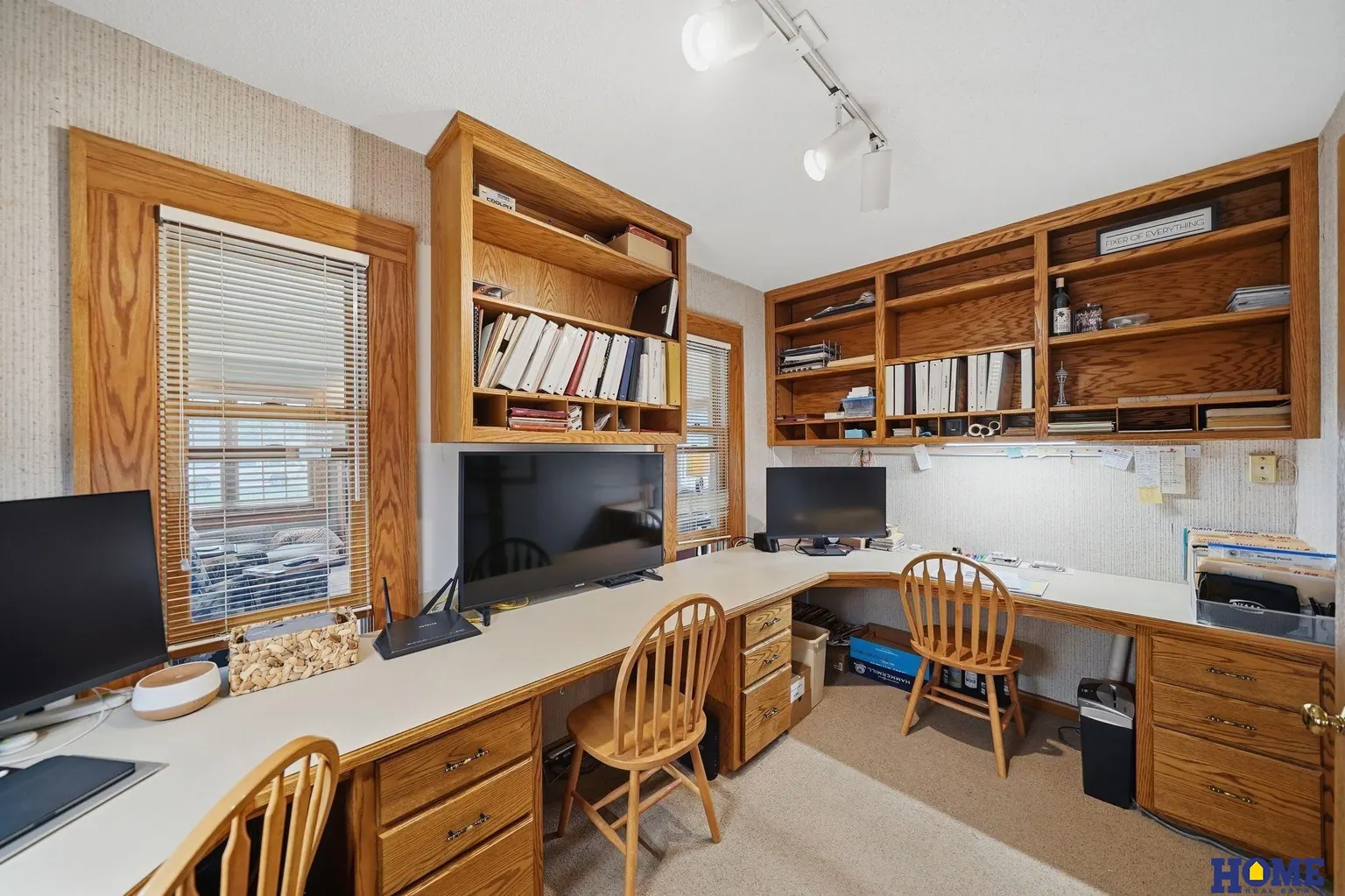 207 W 4th Street: main-level office with long built-in desks and shelves