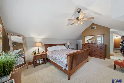 207 W 4th Street: primary bedroom, wide view under the vaulted ceiling, photo 40