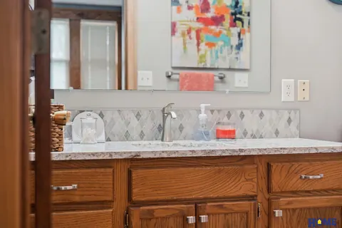 207 W 4th Street: primary suite bath vanity