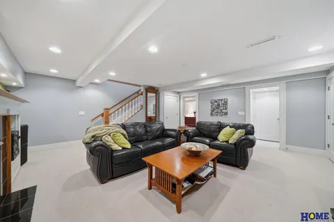 207 W 4th Street: basement family room with recessed lights, photo 45