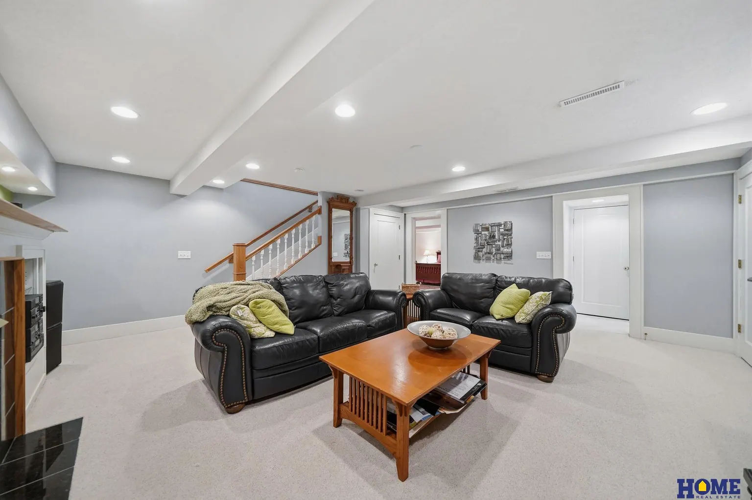 207 W 4th Street: basement family room with recessed lights