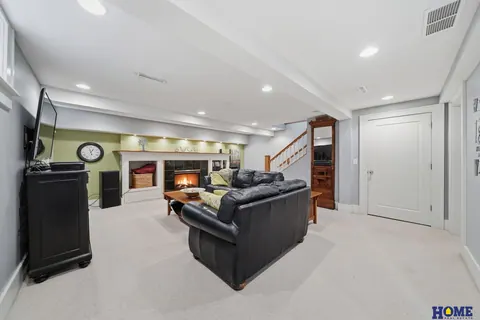 207 W 4th Street: basement family room toward the fireplace