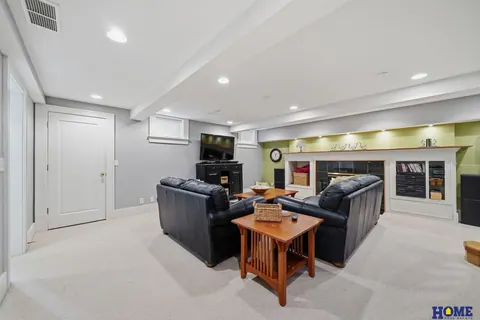 207 W 4th Street: basement family room, wide view