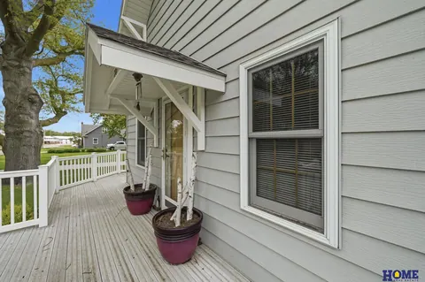 207 W 4th Street: deck by the side entry