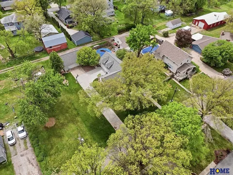 207 W 4th Street: closer aerial view of the neighborhood and trees, photo 70