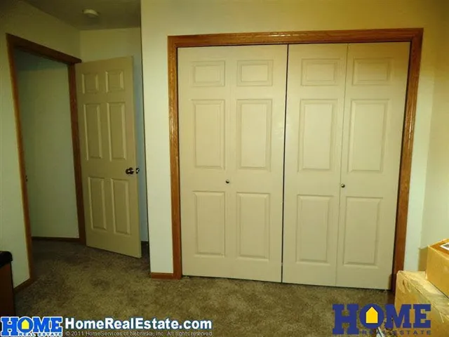7650 Maple Village Dr: upstairs hall and closets, photo 16